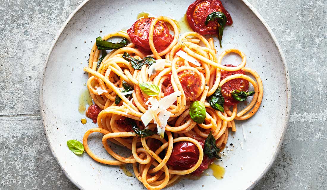 Bucatini with oven-roasted tomatoes and basil